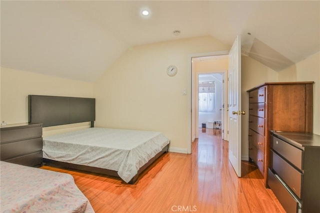 12818 Ramsey Dr, La Mirada, CA 90638 - bedroom with vaulted ceiling, light wood-type flooring, and recessed lighting