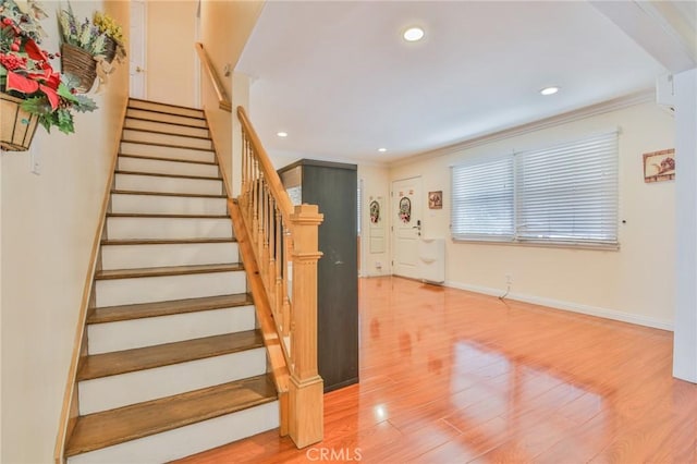 12818 Ramsey Dr, La Mirada, CA 90638 - stairway featuring wood finished floors, recessed lighting, and ornamental molding