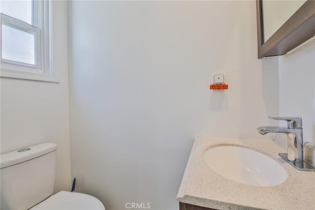 12818 Ramsey Dr, La Mirada, CA 90638 - half bathroom featuring toilet and vanity