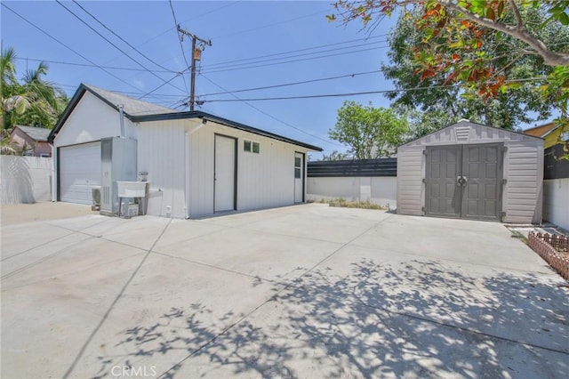 12818 Ramsey Dr, La Mirada, CA 90638 - detached garage featuring a storage unit