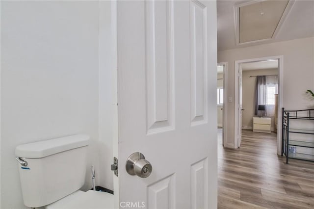 12818 Ramsey Dr, La Mirada, CA 90638 - bathroom featuring toilet and wood finished floors