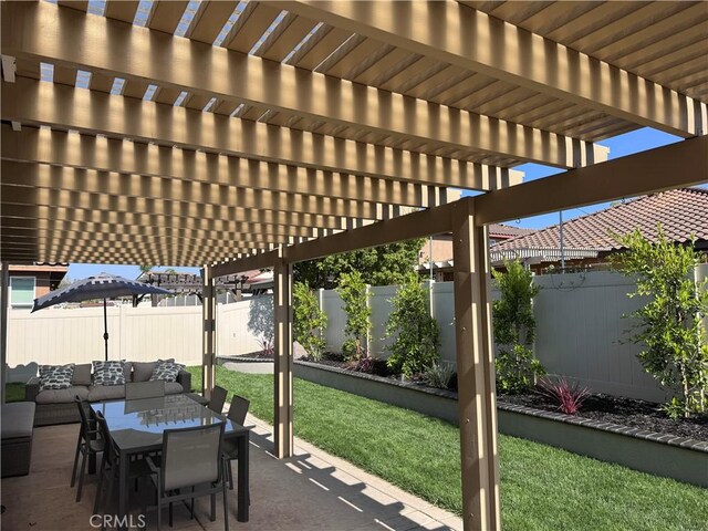 12073 Geode St, Jurupa Valley, CA 91752 - fenced backyard with a pergola, a patio area, and outdoor dining area