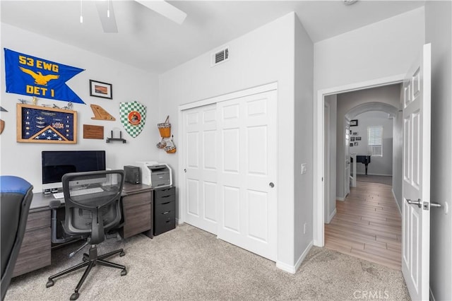 4604 Trojan Ct, Lancaster, CA 93536 - office space featuring ceiling fan, arched walkways, and carpet