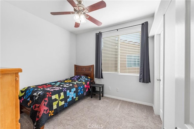 4604 Trojan Ct, Lancaster, CA 93536 - carpeted bedroom featuring baseboards and a ceiling fan