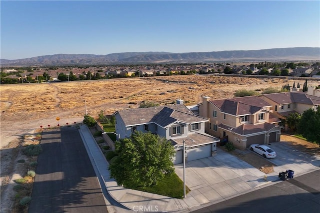 4604 Trojan Ct, Lancaster, CA 93536 - aerial view of residential area featuring a mountain backdrop