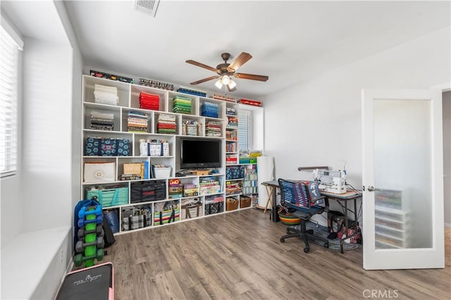 4604 Trojan Ct, Lancaster, CA 93536 - office with a ceiling fan and wood finished floors