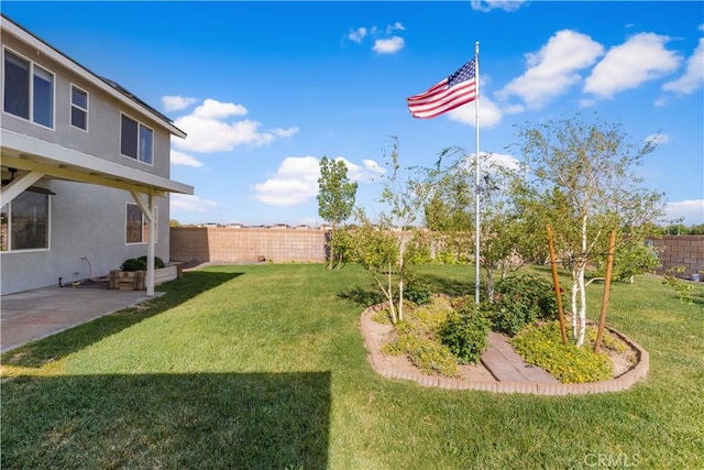 4604 Trojan Ct, Lancaster, CA 93536 - fenced backyard with a patio area