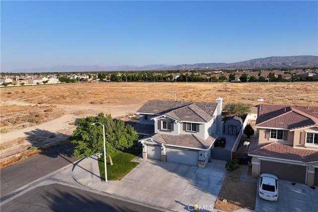 4604 Trojan Ct, Lancaster, CA 93536 - aerial view of property and surrounding area featuring mountains