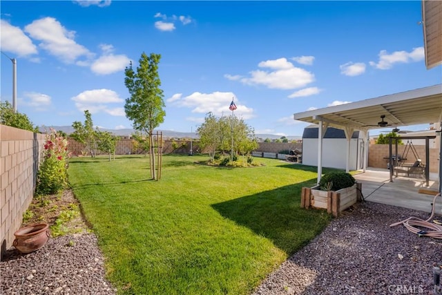 4604 Trojan Ct, Lancaster, CA 93536 - fenced backyard with a patio
