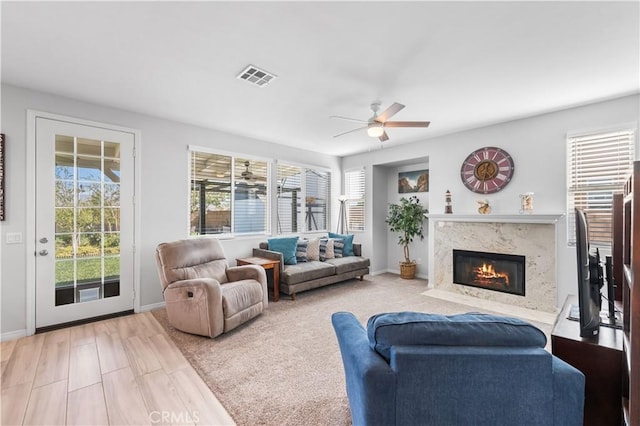 4604 Trojan Ct, Lancaster, CA 93536 - living area with ceiling fan and a high end fireplace