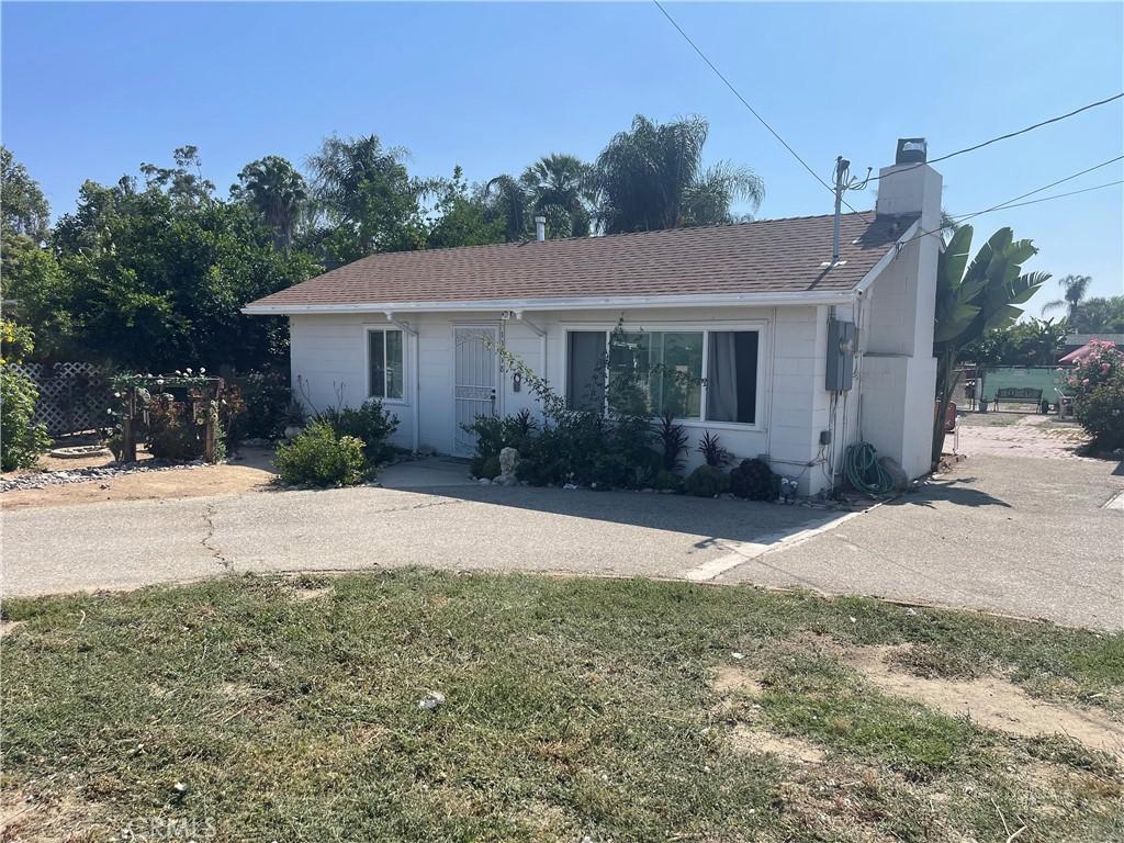 11818 Yorba Ave, Chino, CA 91710 - single story home with a chimney and roof with shingles