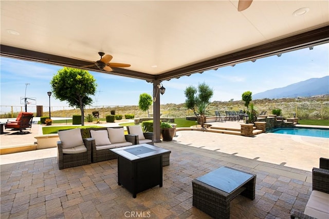 5156 Branding Iron Pl, Rancho Cucamonga, CA 91739 - view of patio featuring a ceiling fan, a mountain view, and outdoor lounge area