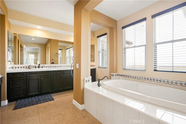 5156 Branding Iron Pl, Rancho Cucamonga, CA 91739 - bathroom featuring vanity, a garden tub, tile patterned floors, and plenty of natural light