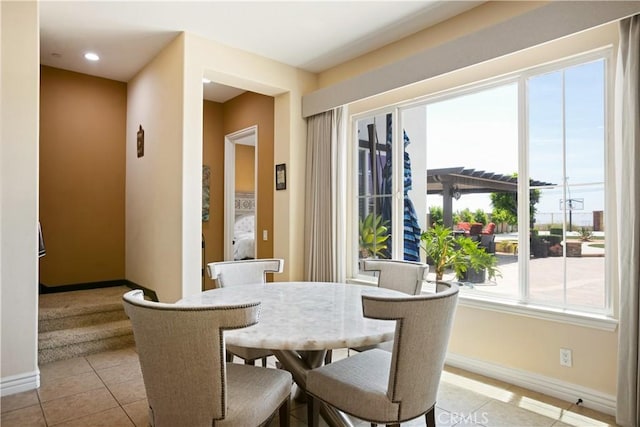 5156 Branding Iron Pl, Rancho Cucamonga, CA 91739 - dining area with light tile patterned floors and recessed lighting