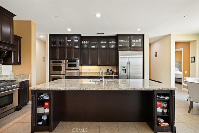 5156 Branding Iron Pl, Rancho Cucamonga, CA 91739 - kitchen with appliances with stainless steel finishes, open shelves, a warming drawer, beverage cooler, and recessed lighting