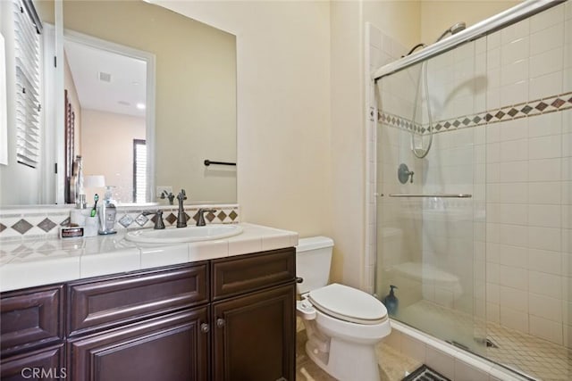 5156 Branding Iron Pl, Rancho Cucamonga, CA 91739 - bathroom featuring a shower stall, vanity, and tasteful backsplash
