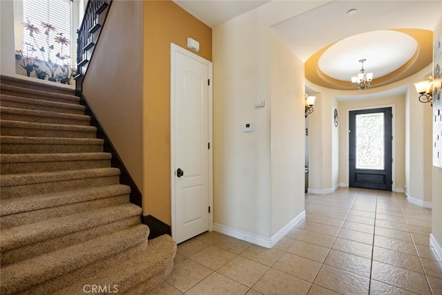 5156 Branding Iron Pl, Rancho Cucamonga, CA 91739 - foyer with a chandelier, stairway, and light tile patterned flooring