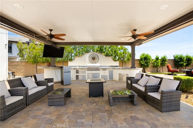 5156 Branding Iron Pl, Rancho Cucamonga, CA 91739 - fenced backyard featuring an outdoor living space, area for grilling, and ceiling fan