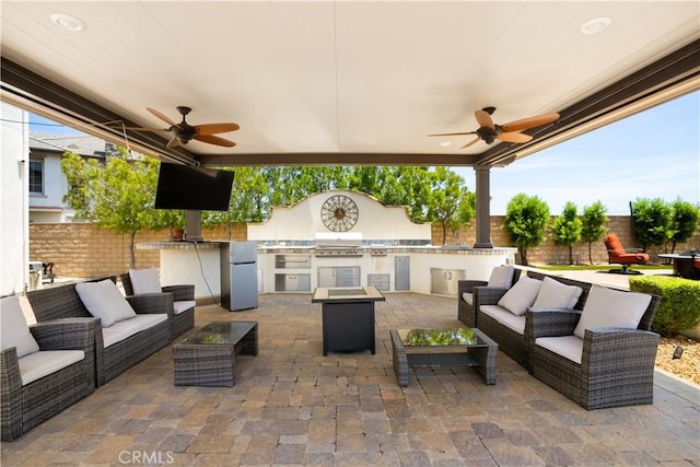 5156 Branding Iron Pl, Rancho Cucamonga, CA 91739 - fenced backyard featuring outdoor lounge area, a ceiling fan, and area for grilling