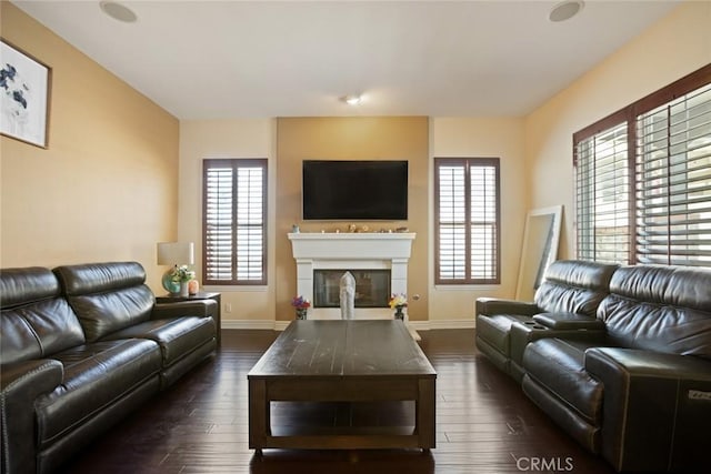 5156 Branding Iron Pl, Rancho Cucamonga, CA 91739 - living area with a glass covered fireplace and dark wood finished floors