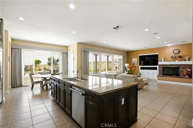 5156 Branding Iron Pl, Rancho Cucamonga, CA 91739 - kitchen featuring dishwasher, light tile patterned flooring, plenty of natural light, and recessed lighting