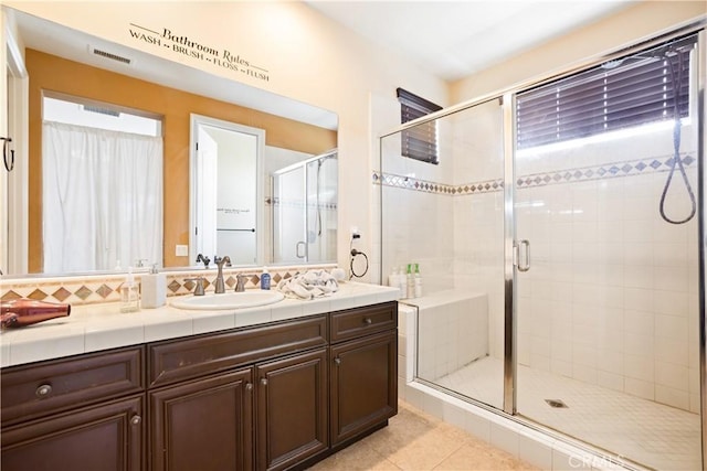 5156 Branding Iron Pl, Rancho Cucamonga, CA 91739 - bathroom featuring vanity, a stall shower, and tile patterned flooring