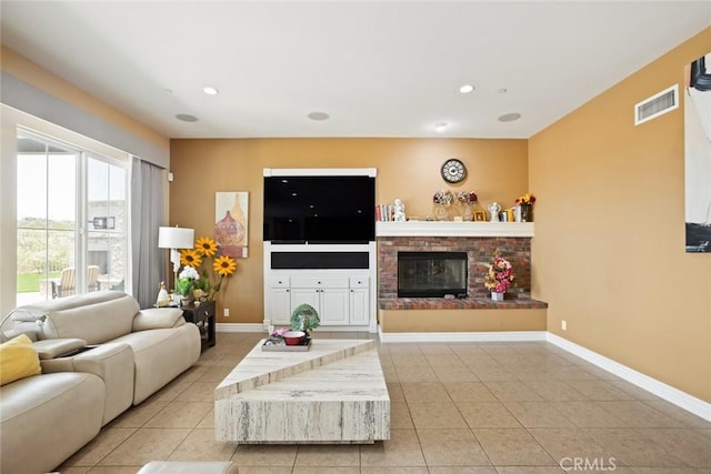 5156 Branding Iron Pl, Rancho Cucamonga, CA 91739 - living area featuring light tile patterned floors, a brick fireplace, and recessed lighting