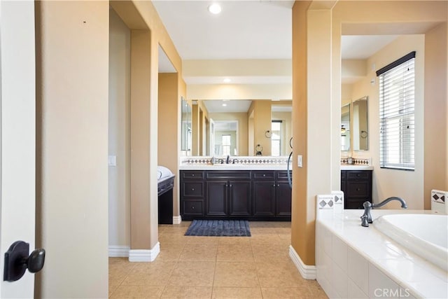 5156 Branding Iron Pl, Rancho Cucamonga, CA 91739 - bathroom featuring vanity, a bath, and tile patterned flooring