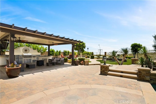 5156 Branding Iron Pl, Rancho Cucamonga, CA 91739 - view of patio featuring area for grilling, a ceiling fan, and an outdoor living space