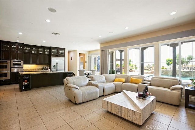 5156 Branding Iron Pl, Rancho Cucamonga, CA 91739 - living area with light tile patterned floors and recessed lighting