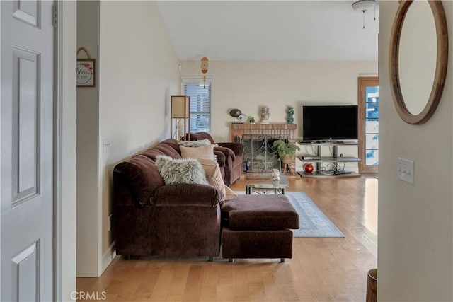 12528 Sonora Way, Victorville, CA 92392 - living area featuring light wood-style floors and vaulted ceiling