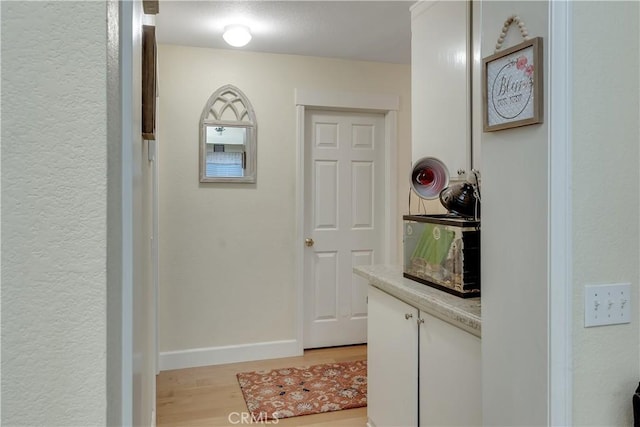12528 Sonora Way, Victorville, CA 92392 - hallway with light wood finished floors and baseboards