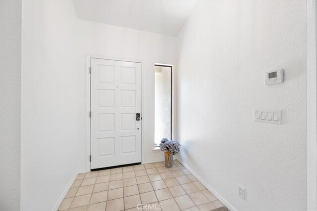 247 Oakwood Ct, Arroyo Grande, CA 93420 - entryway with light tile patterned floors and baseboards
