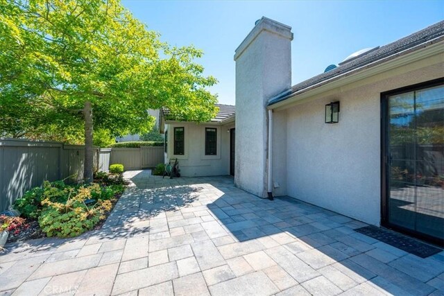 247 Oakwood Ct, Arroyo Grande, CA 93420 - fenced backyard with a patio area