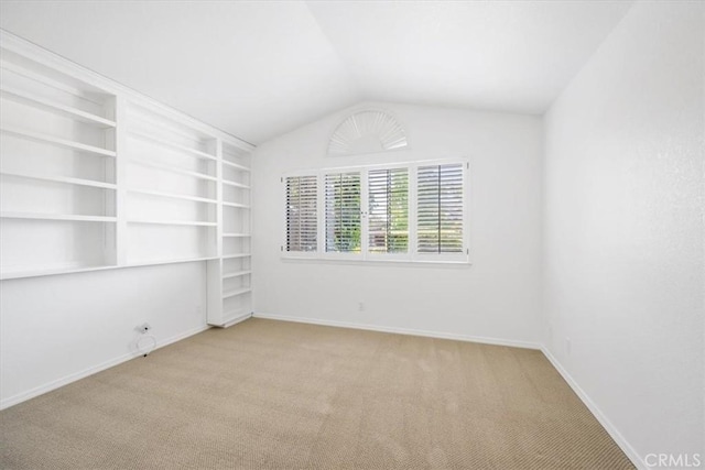 247 Oakwood Ct, Arroyo Grande, CA 93420 - unfurnished room with carpet, lofted ceiling, and built in shelves