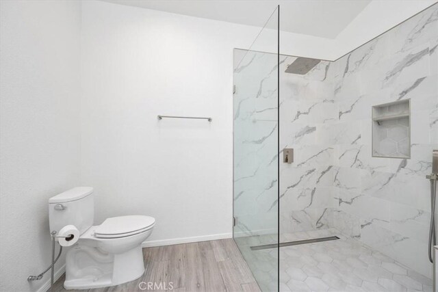 247 Oakwood Ct, Arroyo Grande, CA 93420 - bathroom featuring a marble finish shower and wood finished floors