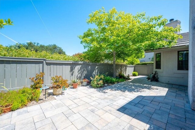 247 Oakwood Ct, Arroyo Grande, CA 93420 - fenced backyard with a patio