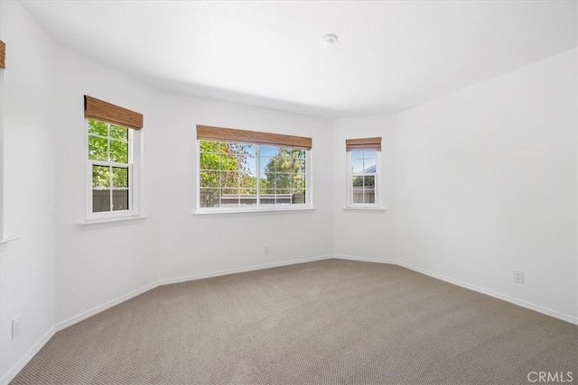 247 Oakwood Ct, Arroyo Grande, CA 93420 - carpeted spare room with baseboards