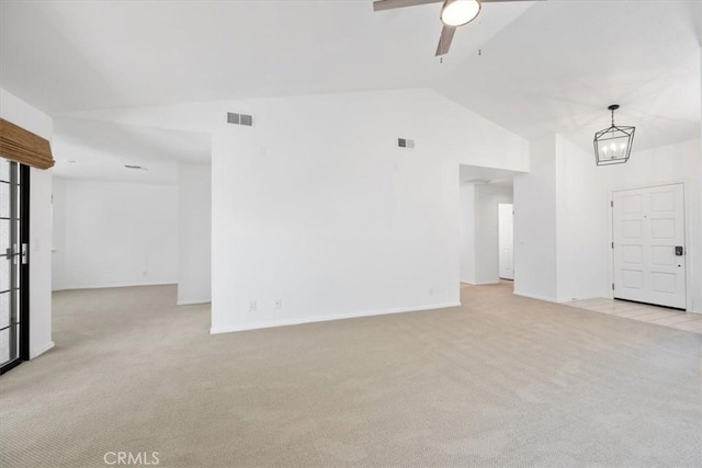 247 Oakwood Ct, Arroyo Grande, CA 93420 - unfurnished living room featuring light colored carpet, lofted ceiling, and ceiling fan