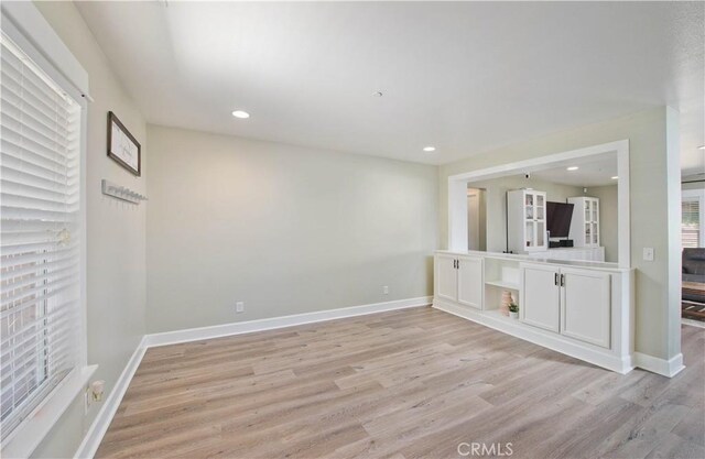 44255 Cajun St, Lancaster, CA 93535 - spare room featuring light wood-type flooring, recessed lighting, and plenty of natural light
