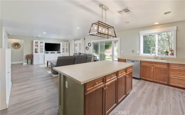 44255 Cajun St, Lancaster, CA 93535 - kitchen with dishwasher, light wood-style floors, plenty of natural light, and recessed lighting