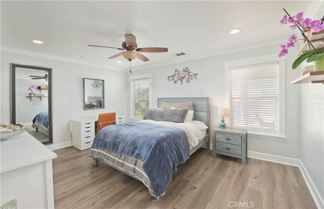44255 Cajun St, Lancaster, CA 93535 - bedroom with light wood-type flooring, ornamental molding, recessed lighting, and ceiling fan