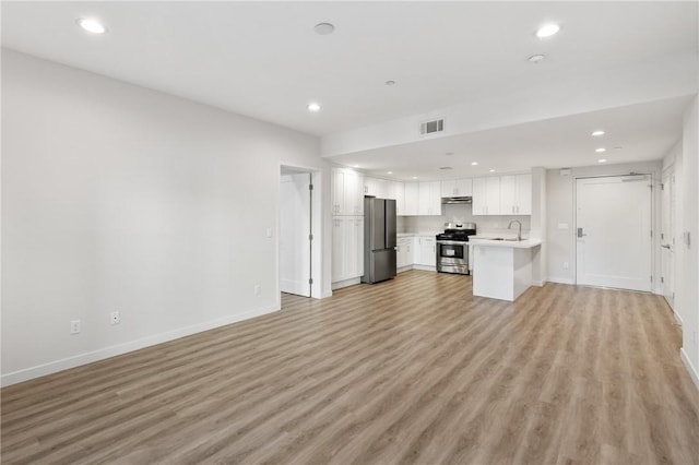 419 N Chandler Ave Unit 520, Monterey Park, CA 91754 - unfurnished living room featuring light wood finished floors and recessed lighting