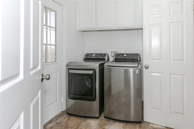 44105 Acacia St, Lancaster, CA 93535 - washroom with separate washer and dryer and cabinet space