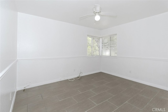 44105 Acacia St, Lancaster, CA 93535 - spare room featuring a ceiling fan and baseboards