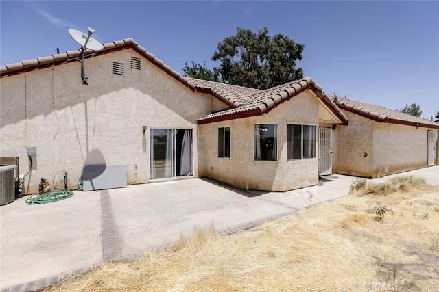 44105 Acacia St, Lancaster, CA 93535 - rear view of property with stucco siding, a patio, and a tile roof