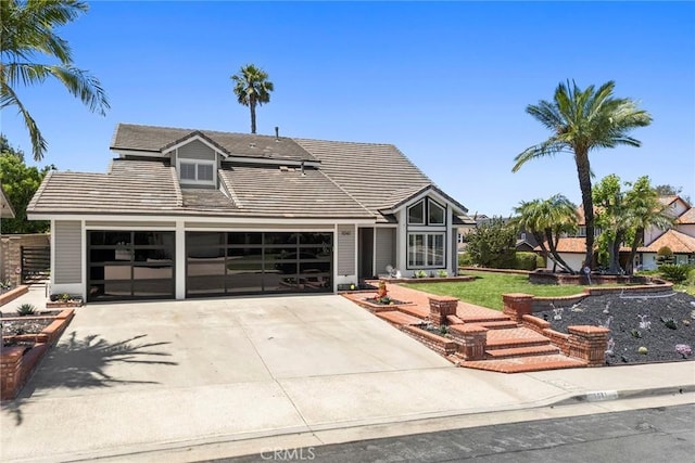 1041 S Falling Leaf Cir, Anaheim Hills, CA 92807 - traditional-style home with driveway, a tile roof, and a garage