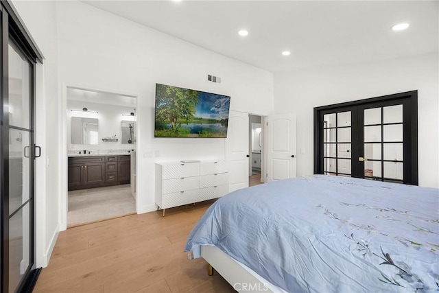 1041 S Falling Leaf Cir, Anaheim Hills, CA 92807 - bedroom featuring french doors, light wood finished floors, recessed lighting, and ensuite bath