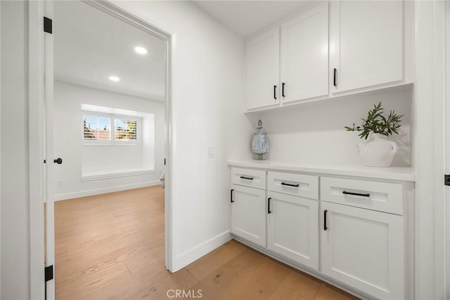 1041 S Falling Leaf Cir, Anaheim Hills, CA 92807 - bar area with light wood-style floors and recessed lighting