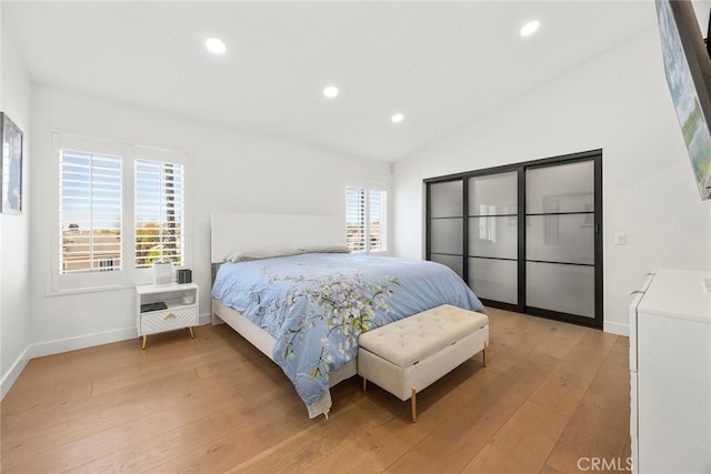 1041 S Falling Leaf Cir, Anaheim Hills, CA 92807 - bedroom with light wood-style flooring, recessed lighting, and lofted ceiling